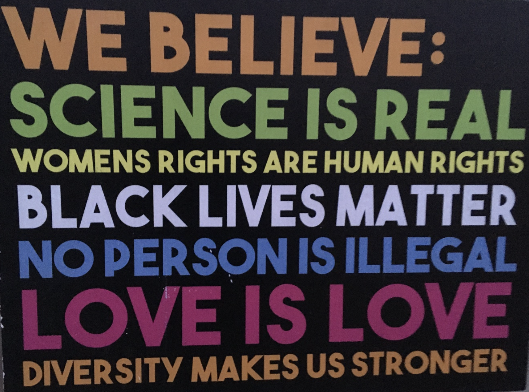 a yard sign that reads 
